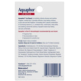 Etiqueta trasera de Aquaphor Lip Repair con lista de ingredientes e instrucciones de uso