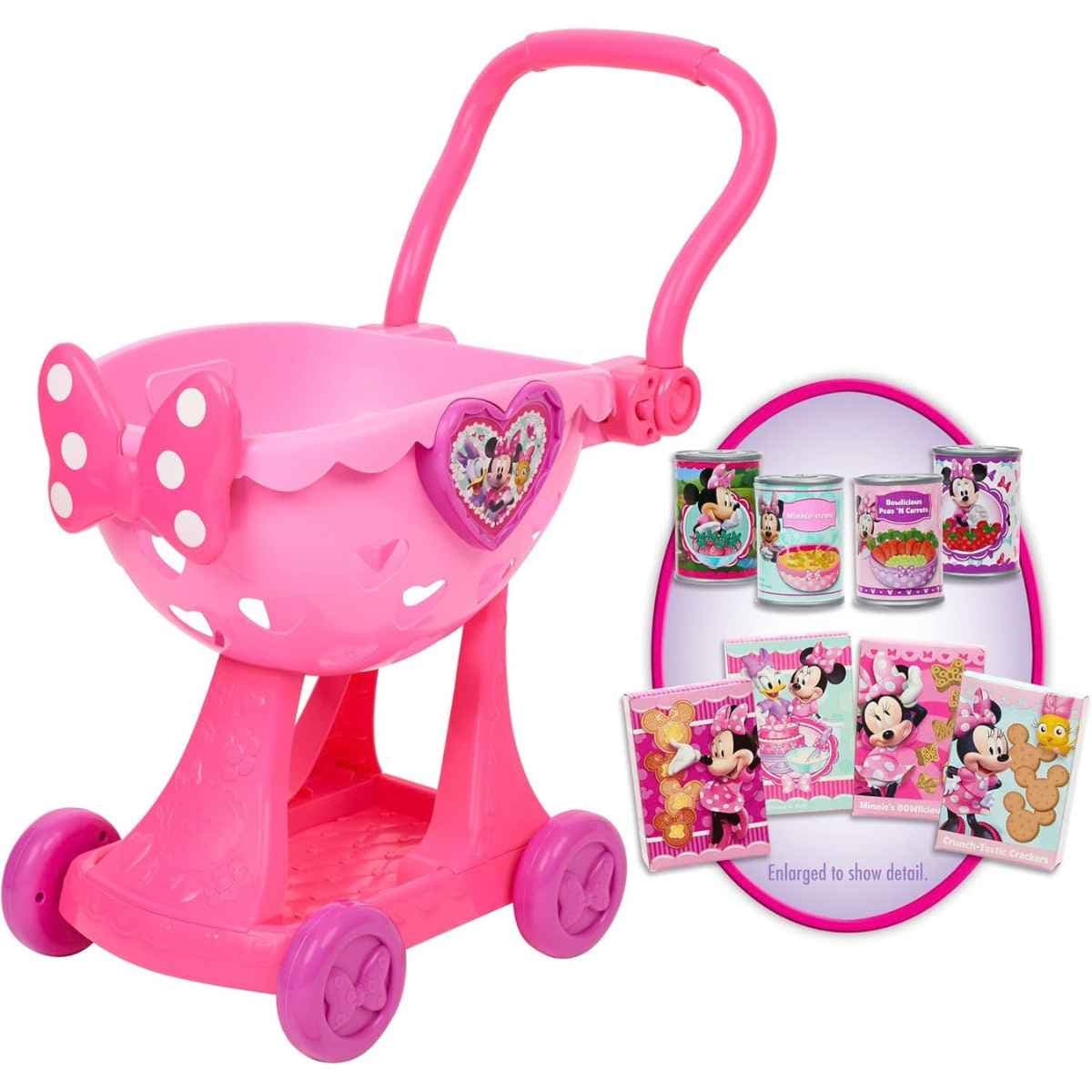 Carrito de compras de juguete Disney Junior Minnie Mouse Bowtique con cuatro latas y cuatro cajas de comida de juguete.